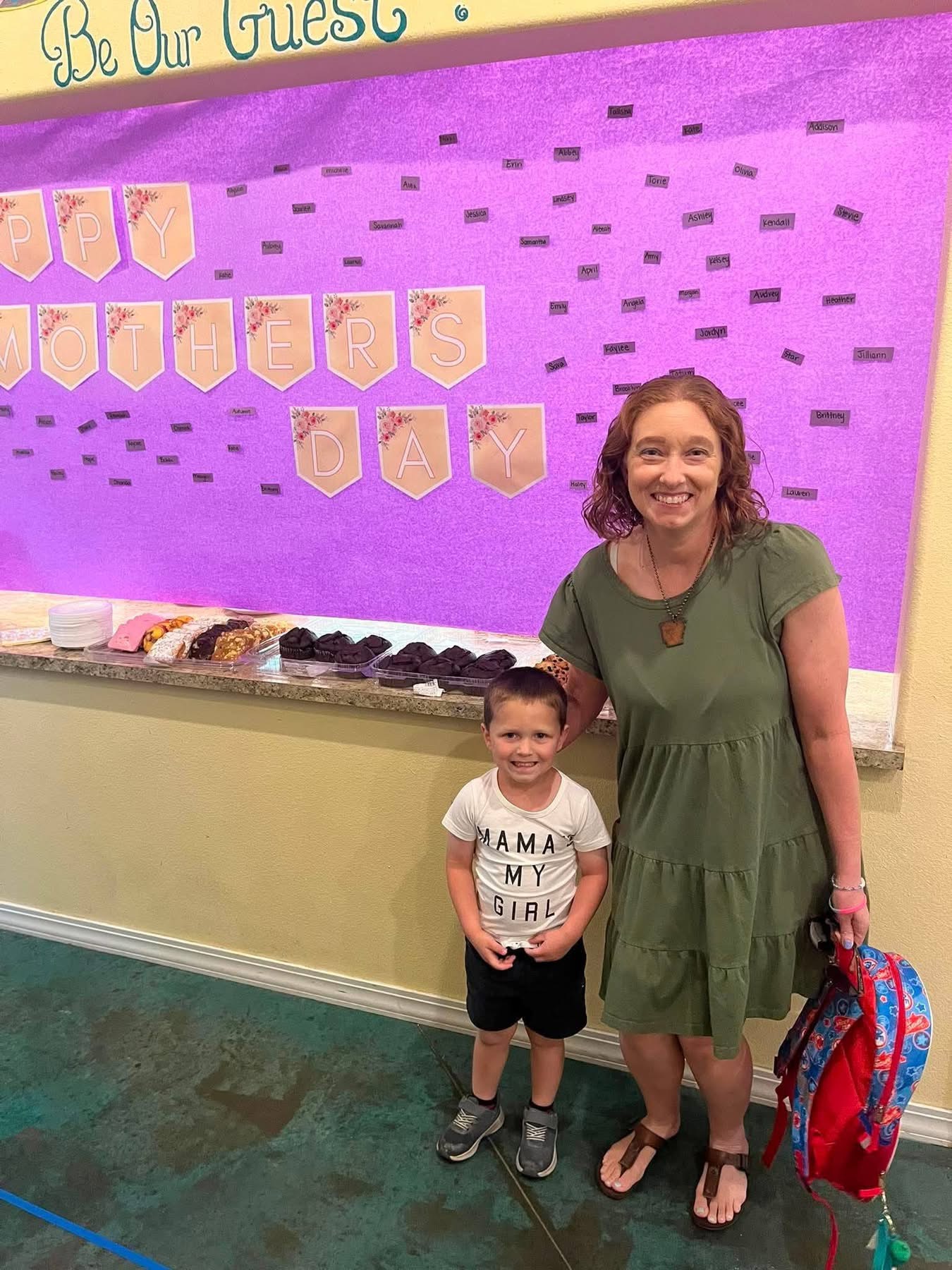 A child and mom enjoying the Muffins with Mom event at Amaze Academy
